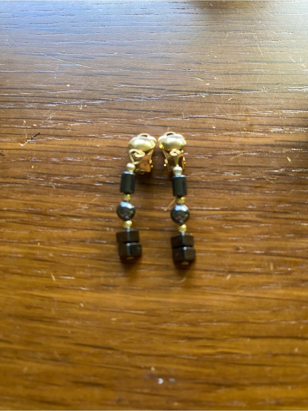 Gold Clip-On Earrings with hematite